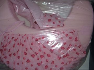 Pinolino félhold alakú szopipárna rózsaszín szivecskés Pinolino félhold alakú szopipárna rózsaszín szivecskés